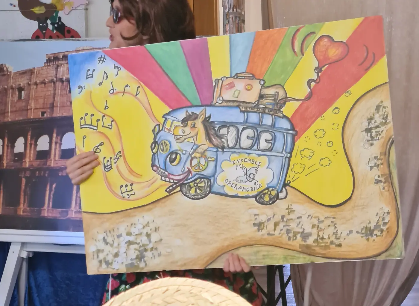 Das Bild zeigt ein Plakat mit einem Bullybus.